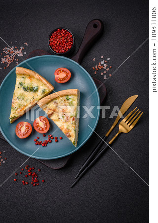 Delicious quiche with broccoli, cheese, chicken, spices and herbs Delicious quiche with broccoli, cheese, chicken, spices and herbs 109311006