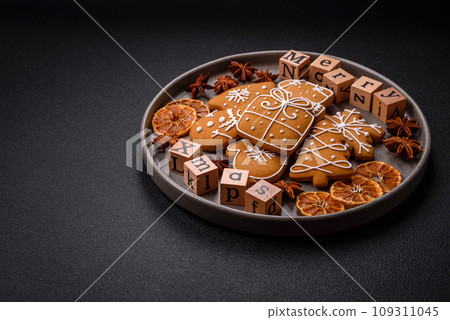 Beautiful Christmas composition with copy space with an inscription in wooden cubes 109311045
