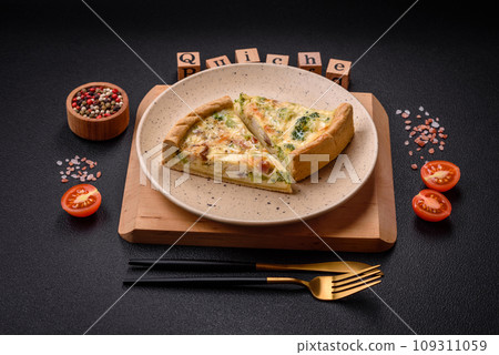 Delicious quiche with broccoli, cheese, chicken, spices and herbs Delicious quiche with broccoli, cheese, chicken, spices and herbs 109311059