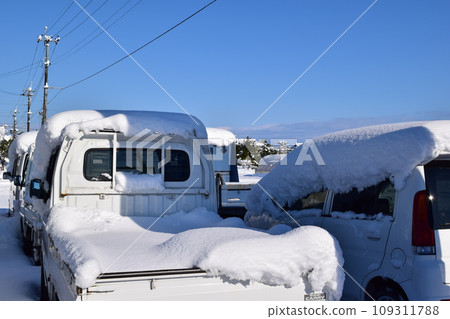 A car buried in heavy snow A car buried in heavy snow 109311788