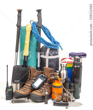Items for tourism and hiking on a white background. set of equipment for tourism and travel Items for tourism and hiking on a white background. set of equipment for tourism and travel 109312482
