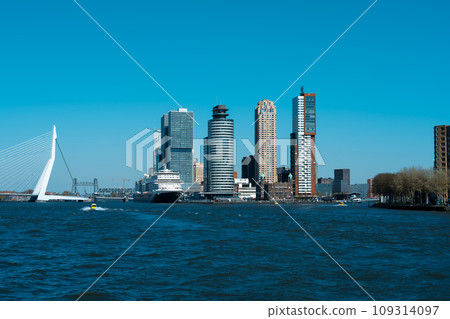 Scenic Rotterdam Cityscape: Famous Bridge and Business Center on a Sunny Day by the Waterfront 109314097