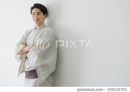 A man wearing a kimono A man wearing a kimono 109315701