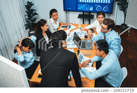 Group of business analyst team analyzing financial data report. Habiliment Group of business analyst team analyzing financial data report. Habiliment 109315719