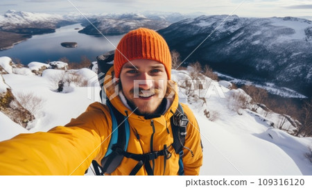Traveler influencer taking selfie during travel in winter season comeliness 109316120