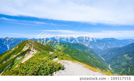 Climbing Mt. Jigatake in summer (view towards Mt. Tsurugidake and Mt. Tateyama from the middle peak of Mt. Jigatake) 109317558