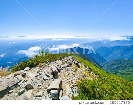 Climbing Mt. Jigatake in summer (view of the Omachi city area from the middle peak of Mt. Jigatake) 109317570