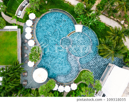 Drone view luxury resort. Swimming pool aerial shot. Drone view luxury resort. Swimming pool aerial shot. 109318035