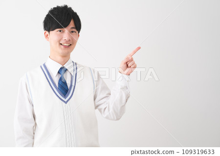 Young man wearing school uniform, student image 109319633