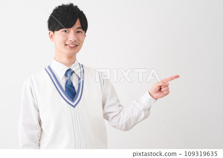 Young man wearing school uniform, student image 109319635