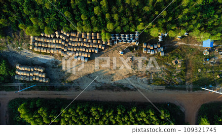 Wooden Coils of Electrical wires at outdoor construction site. High voltage cable roll. Wooden Coils of Electrical wires at outdoor construction site. High voltage cable roll. 109321745