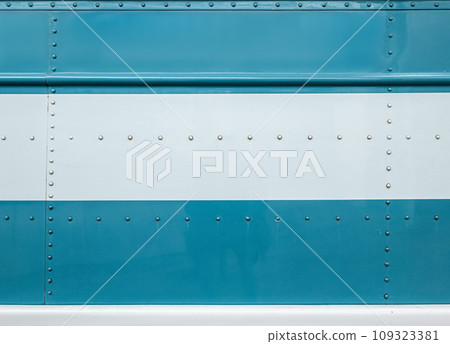 Riveted exterior texture of retro bonnet bus Riveted exterior texture of retro bonnet bus 109323381