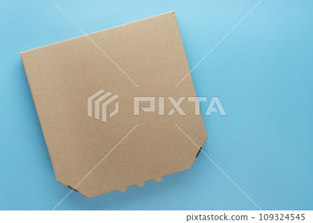 Pizza closed carton box on uniform blue background flat lay mockup with blank space Pizza closed carton box on uniform blue background flat lay mockup with blank space 109324545