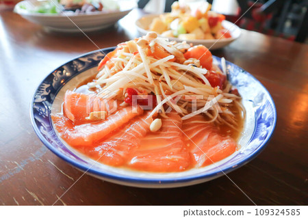 spicy salmon salad or spicy salad , fish salad or salmon salad or som tam or salmon and papaya salad spicy salmon salad or spicy salad , fish salad or salmon salad or som tam or salmon and papaya salad 109324585