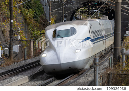 Tokaido Shinkansen emerging from the tunnel Tokaido Shinkansen emerging from the tunnel 109326986