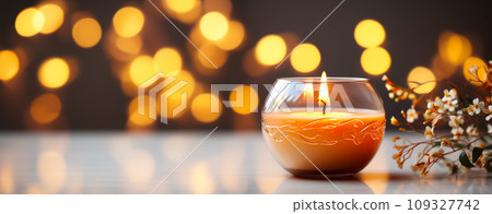 Banner with a burning aromatic candle on a background of New Year's garlands, holiday invitation or postcard and flyer for advertising 109327742