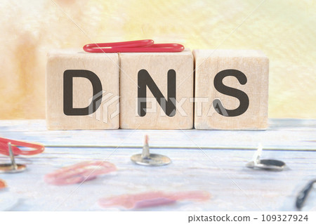 DNS -Domain Name Server signs on wooden cubes on a light background 109327924
