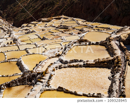 Colorful salt ponds of Maras in the sacred valley of Incas, Cusco region, Peru 109328945