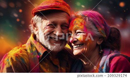 An elderly couple - a man and a woman with joyful faces at the celebration of the Holi festival. An elderly couple - a man and a woman with joyful faces at the celebration of the Holi festival. 109329174