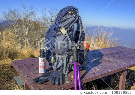 Climbing safety equipment: bear repellent spray, bear bell, beacon 109329892