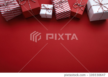 Gift boxes on color background, flat lay, space for text Gift boxes on color background, flat lay, space for text 109330647