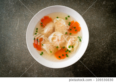 shrimp dumpling soup in white bowl shrimp dumpling soup in white bowl 109330830