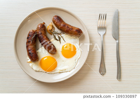 double fried egg with pork sausage 109330897