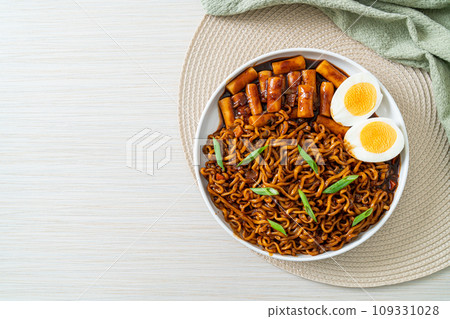 Jjajang Rabokki - Korean instant noodles or Ramyeon with Korean rice cake or Tteokbokki and egg in black bean sauce Jjajang Rabokki - Korean instant noodles or Ramyeon with Korean rice cake or Tteokbokki and egg in black bean sauce 109331028