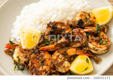 jerk shrimps or grilled shrimps in Jamaica style with rice jerk shrimps or grilled shrimps in Jamaica style with rice 109331171