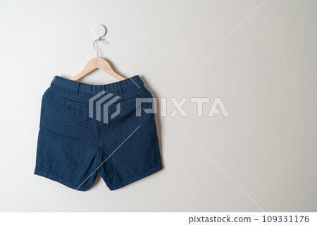 short pants hanging on wall short pants hanging on wall 109331176