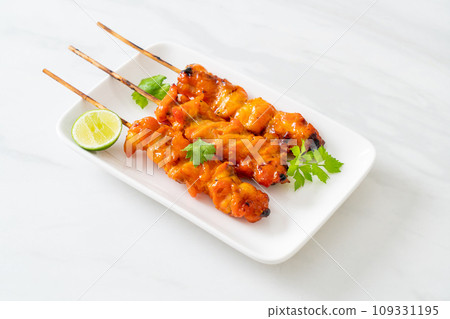 grilled chicken skewer with herbs and spices 109331195