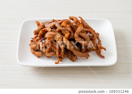 Sun-Dried Pork on white plate 109331246