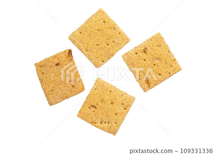 Several square crackers. Carbohydrate snack. Isolated on white background. 109331336
