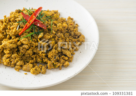 Stir Fried Pork with Yellow Curry Paste Stir Fried Pork with Yellow Curry Paste 109331381