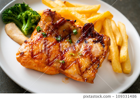 grilled chicken steak with potato chips or french fries 109331486