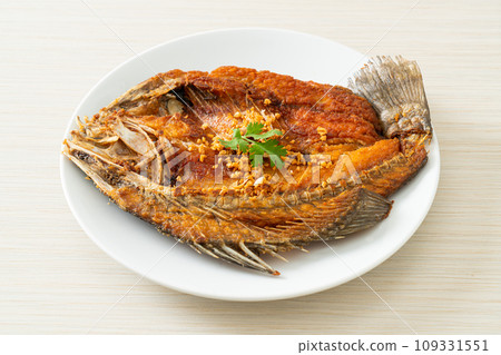 Fried Sea Bass Fish with Garlic 109331551