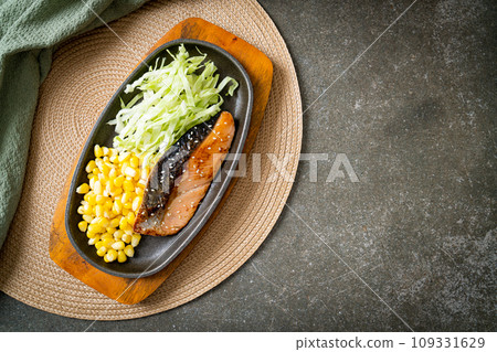 grilled salmon fillet steak on hot plate grilled salmon fillet steak on hot plate 109331629