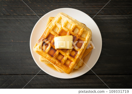 waffle stack with butter and honey 109331719