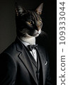 a cat in a tuxedo is looking at the camera while wearing a suit and bow tie with a black background 109333044