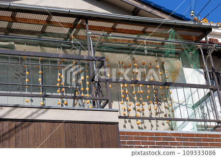Veranda with dried persimmons Veranda with dried persimmons 109333086