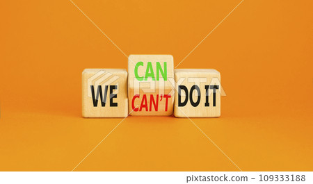 We can do it symbol. Concept word We can or can not do it on beautiful wooden cubes. Beautiful orange table orange background. Business and we can or not do it concept. Copy space. We can do it symbol. Concept word We can or can not do it on beautiful wooden cubes. Beautiful orange table orange background. Business and we can or not do it concept. Copy space. 109333188