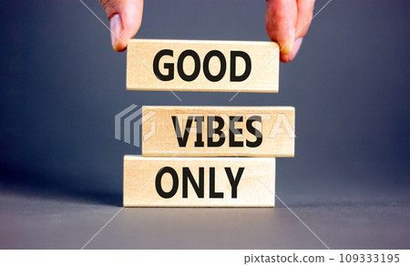 Good vibes only symbol. Concept word Good vibes only on beautiful wooden block. Businessman hand. Beautiful grey table grey background. Business motivational good vibes only concept. Copy space. 109333195