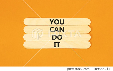 You can do it symbol. Concept word You can do it on beautiful wooden stick. Beautiful orange table orange background. Business motivational you can do it concept. Copy space. You can do it symbol. Concept word You can do it on beautiful wooden stick. Beautiful orange table orange background. Business motivational you can do it concept. Copy space. 109333217