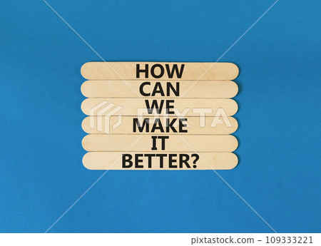 We make it better symbol. Concept words How can we make it better on wooden stick. Beautiful blue table blue background. Business we make it better concept. Copy space. We make it better symbol. Concept words How can we make it better on wooden stick. Beautiful blue table blue background. Business we make it better concept. Copy space. 109333221