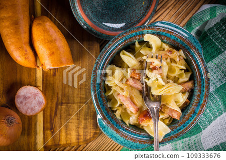 Pasta with sauerkraut and sausage. Pasta with sauerkraut and sausage. 109333676