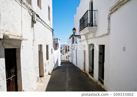 Beautiful streets of Vejer de la Frontera, Spain, Andalusia region, Costa de la Luz, Cadiz district, White Towns, Iberian Peninsula, Old town. Ruta de los Pueblos Blancos Beautiful streets of Vejer de la Frontera, Spain, Andalusia region, Costa de la Luz, Cadiz district, White Towns, Iberian Peninsula, Old town. Ruta de los Pueblos Blancos 109333802