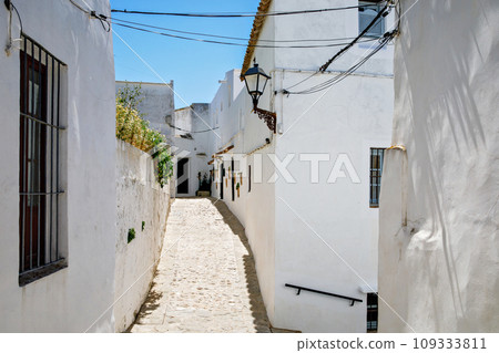 Beautiful streets of Vejer de la Frontera, Spain, Andalusia region, Costa de la Luz, Cadiz district, White Towns, Iberian Peninsula, Old town. Ruta de los Pueblos Blancos Beautiful streets of Vejer de la Frontera, Spain, Andalusia region, Costa de la Luz, Cadiz district, White Towns, Iberian Peninsula, Old town. Ruta de los Pueblos Blancos 109333811