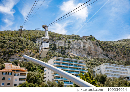 Cable car close to the top of Gibraltar rock. Cable car is a comfortable way to get to Alameda Wildlife Conservation Park in Gibraltar. 109334034