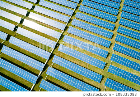 Aerial view of Solar Panels Farm Solar Cell Station. Production of clean energy. Renewable green alternative energy concept. 109335088