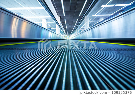Motion blur of moving escalator in airport perspective view 109335376